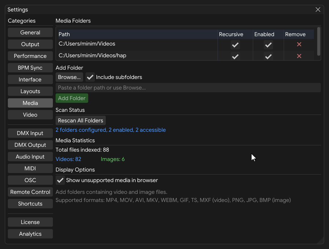 Media settings tab showing folder list and scan status